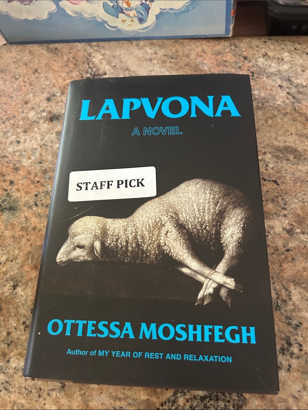 Lapvona by Ottessa Moshfegh - Black Cover with Blue Text